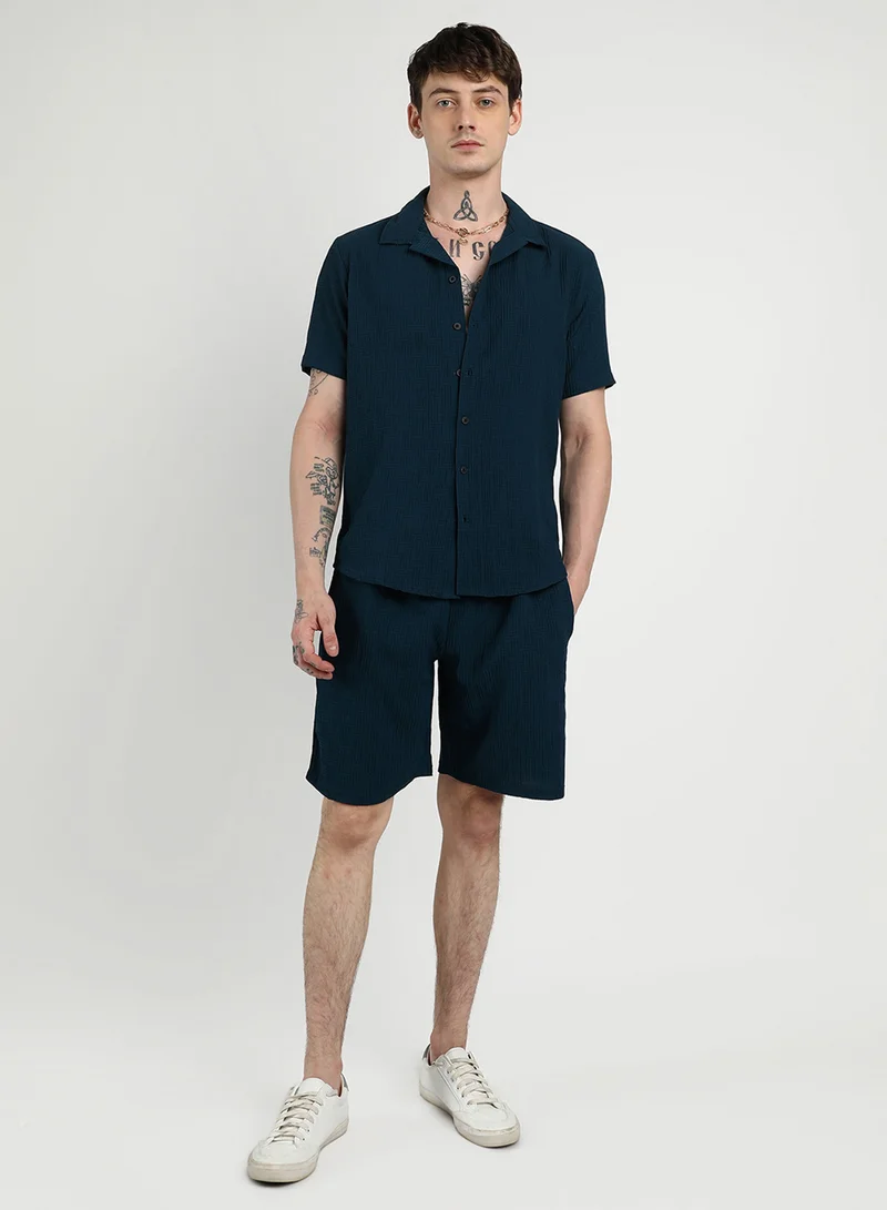 Campus Sutra  Men's Navy Blue Textured Interwine Co-Ord Set For Casual Wear | Cuban Collar | Short Sleeve | Button Closure | Co-Ords Crafted With Comfort Fit For Everyday Wear for Men | Best Price UAE